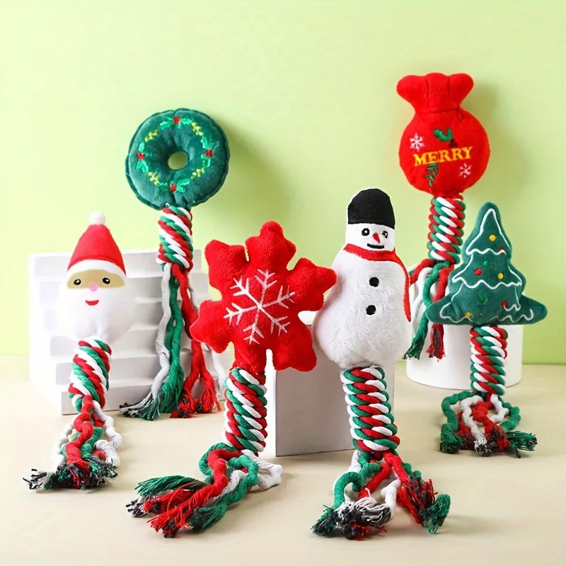 Both sets together: six Christmas rope toys standing in a row