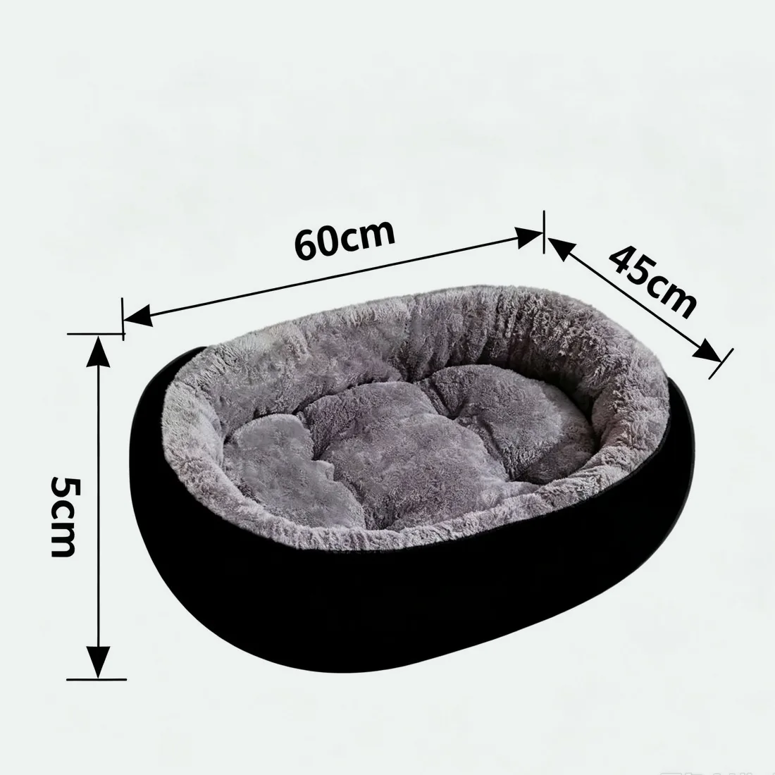 The smaller oval fleece bed marked 60 cm long and 45 cm wide