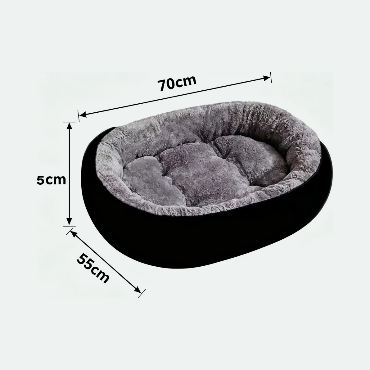 The larger oval fleece bed marked 70 cm long and 55 cm wide