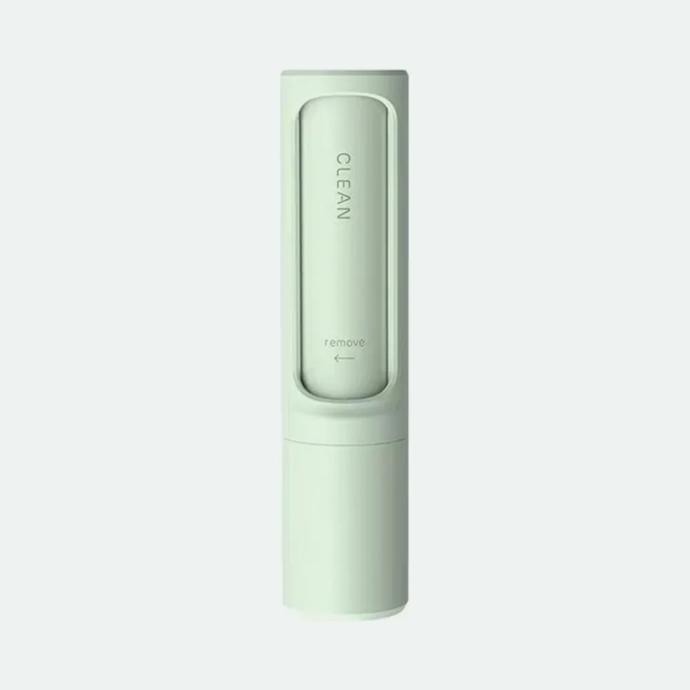 Mint green handheld reusable pet hair remover