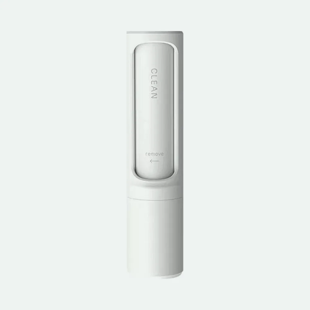 White handheld reusable pet hair remover