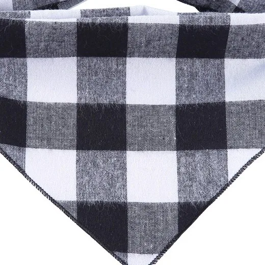 Close-up of the black and white check cotton and its stitched edge