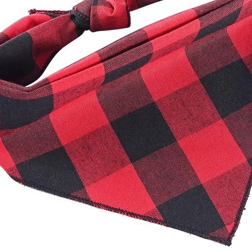 Close-up of the red and black check cotton and its stitched edge
